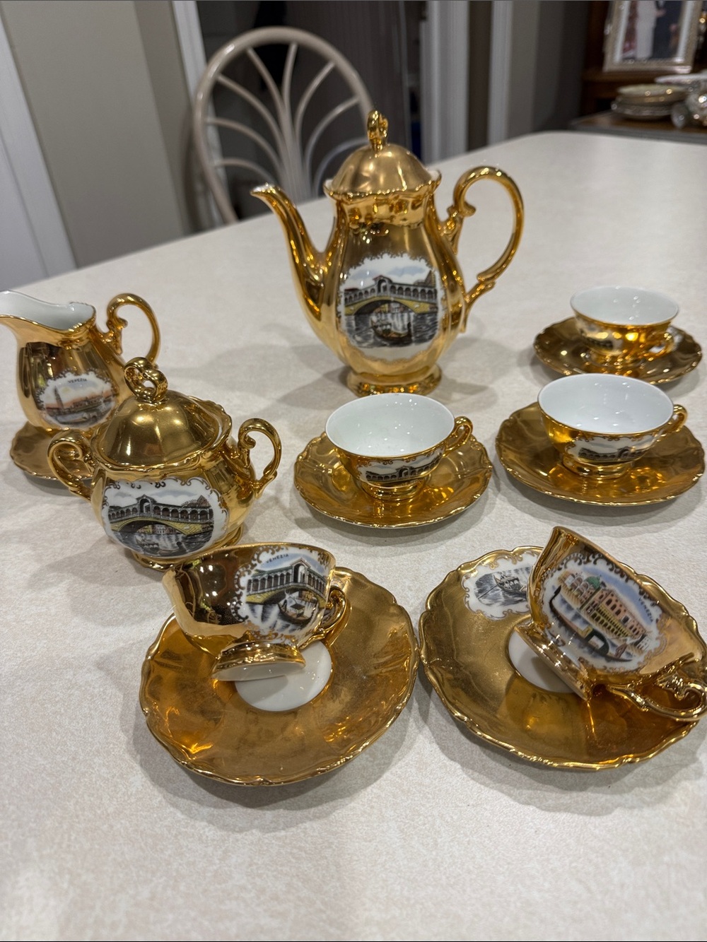Venezia from Italy, tea, pot creamer, sugar bowl, and tea cups shiny gold color